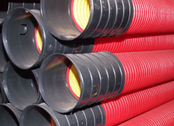 Труба гофрированная жесткая (усиленная) двустенная электротехническая из полиэтилена (10 кПа), д125мм, цвет красный, с муфтой DKC